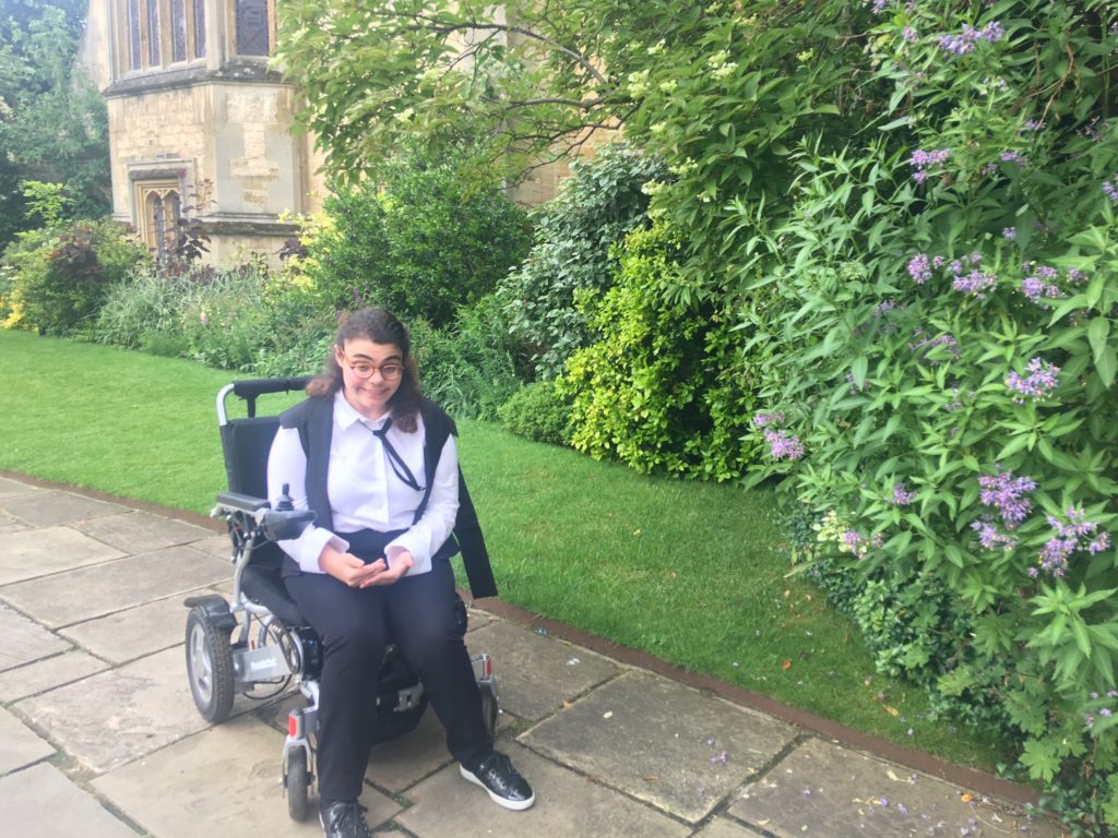 alt text=me in my black and white subfusc enjoying the beauty of Pembroke College in Oxford